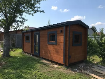 Мобильная баня 7×2,4 м из профилированного бруса